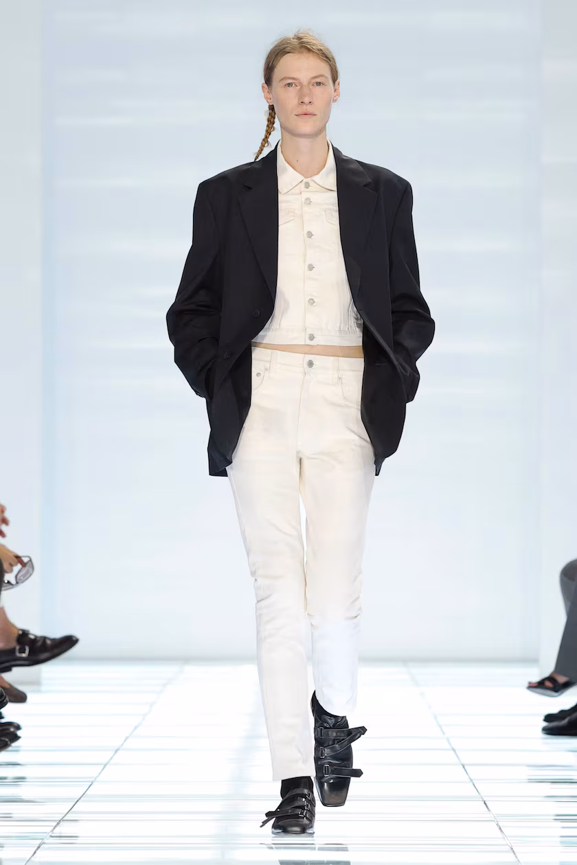Prada Spring/Summer 2027 menswear look with white jeans, white shirt and black blazer