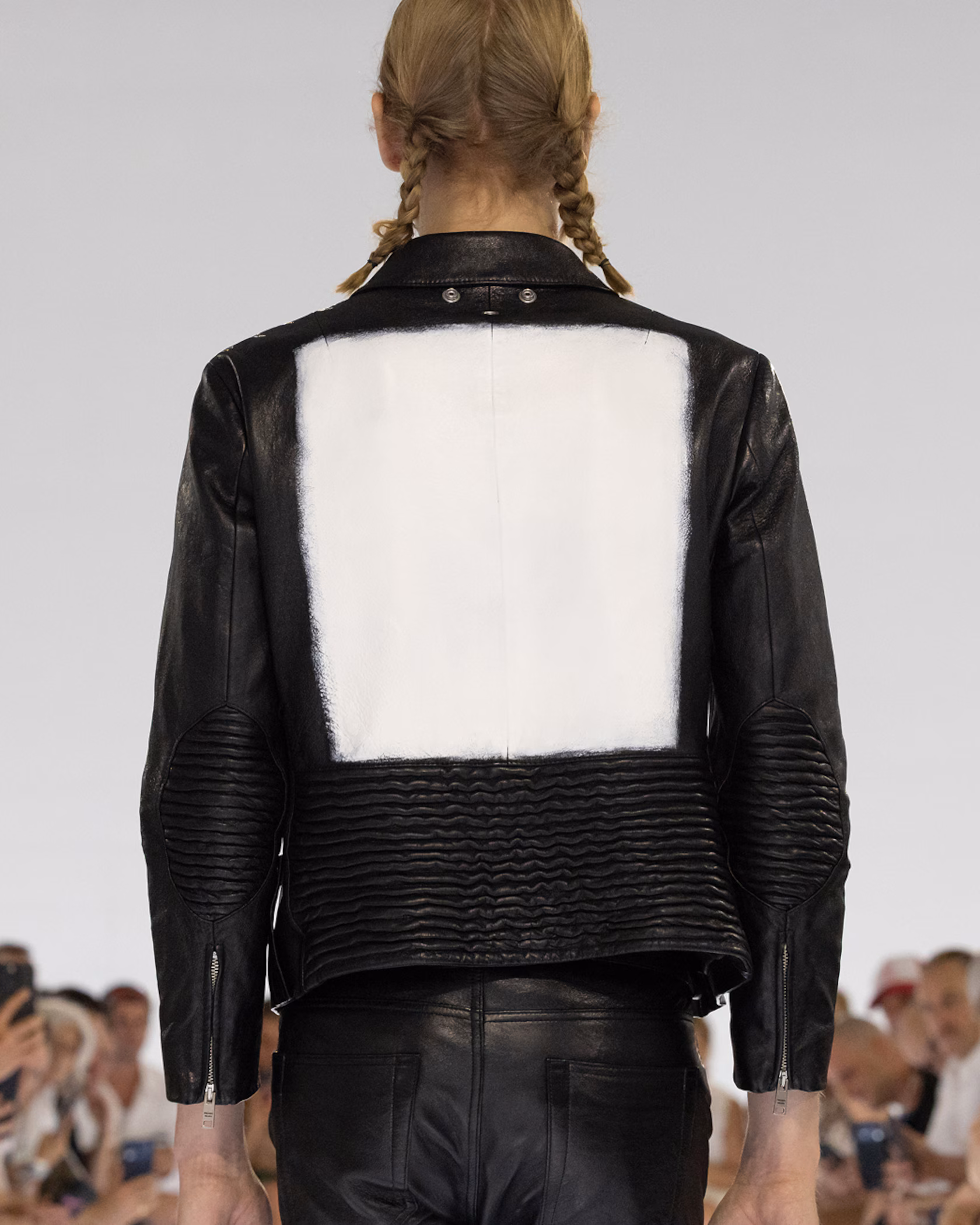 Prada Spring/Summer 2027 menswear runway looks with slim jeans, leather jackets and waist pouches