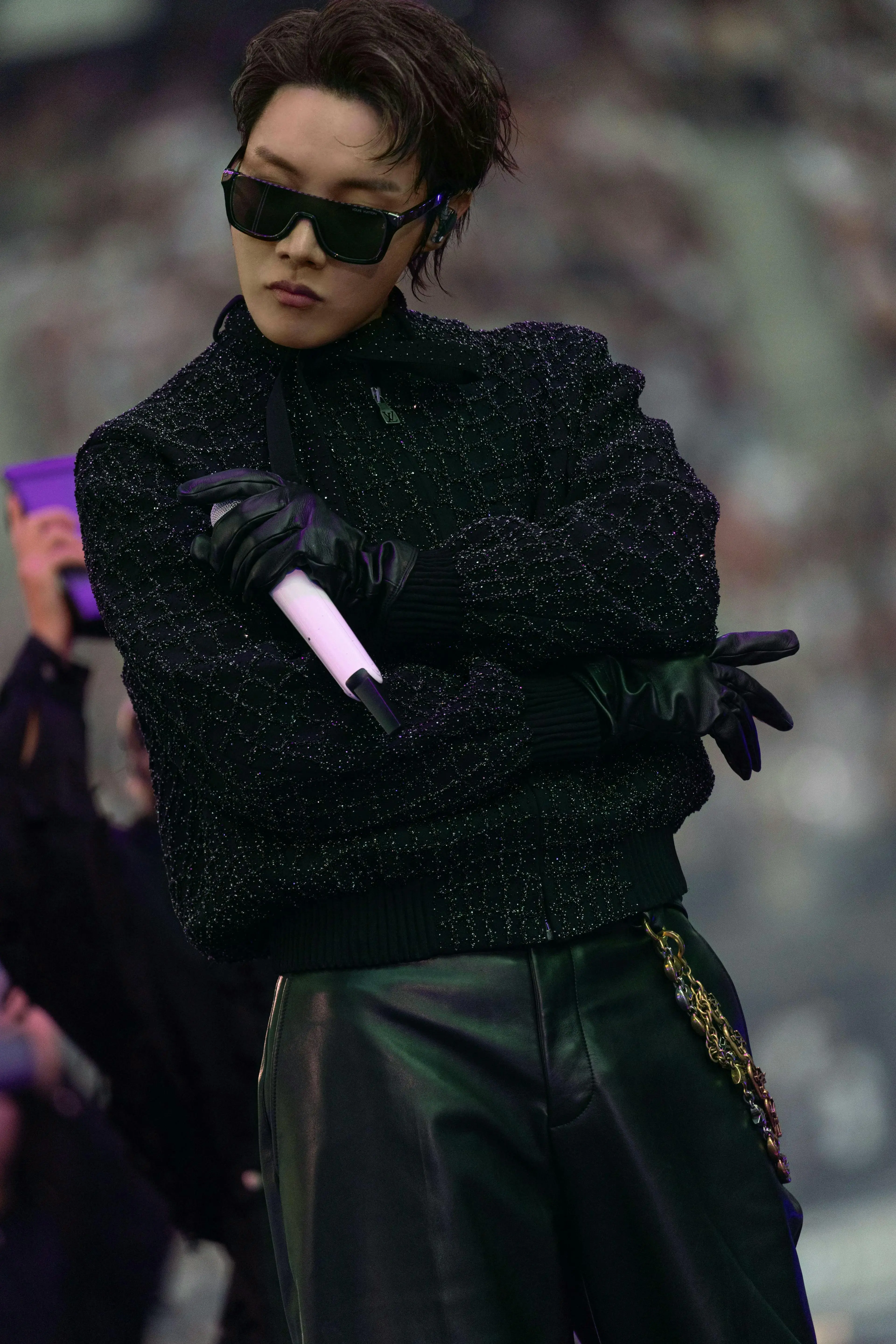 BTS ARIRANG: Inside the Looks of the World Tour Vanity Teen 虚荣青年 j-hope of BTS wearing a black Louis Vuitton jacket with crocodile-motif embroidery and leather trousers during the ARIRANG World Tour in Paris.