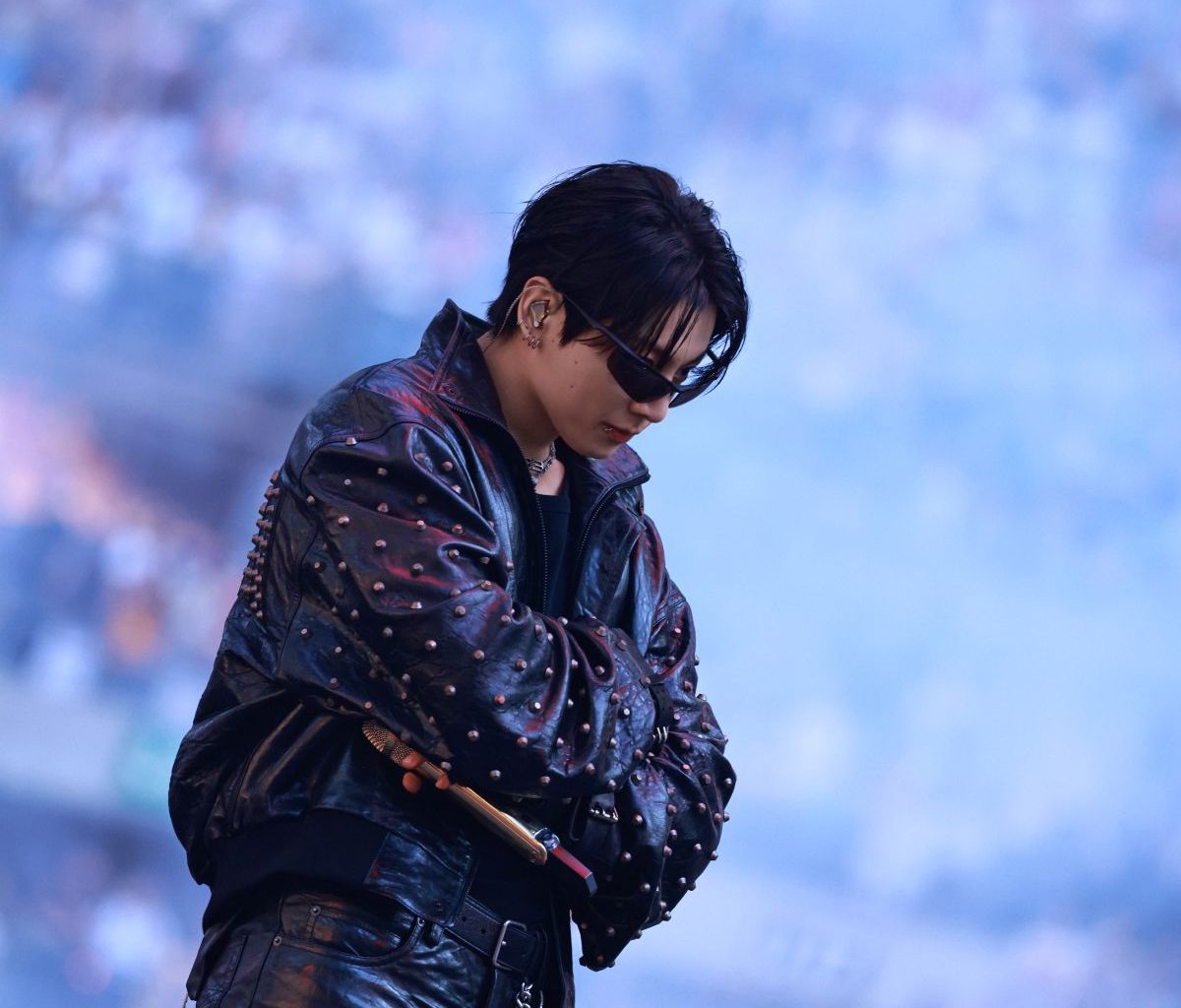 Jung Kook of BTS wearing a custom black leather Balenciaga look during the ARIRANG World Tour in Paris.