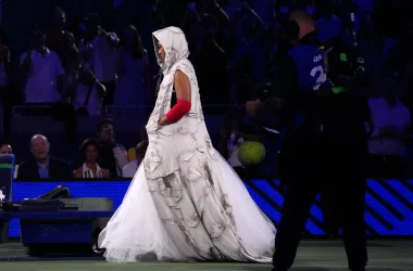 Naomi Osaka walks onto Arthur Ashe Stadium in a custom Who Decides War look