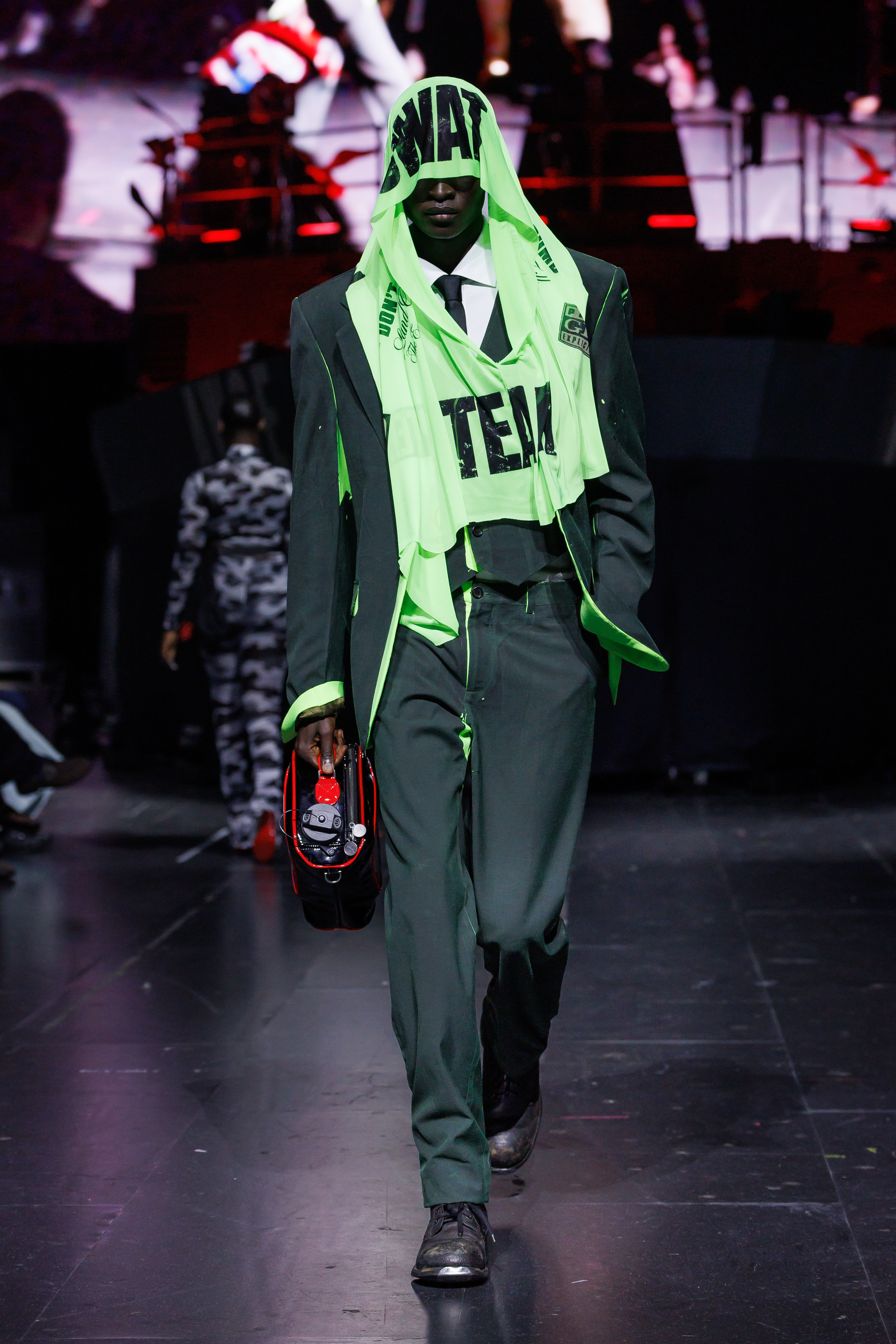 AWGE Turns the Warship Into a Daring Runway for Spring Summer 2027 Vanity Teen A$AP Rocky's AWGE / Anti-War Global Economics brings military codes, concert dressing, luxury and streetwear together for a collection that stays deliberately caught between seriousness and spectacle.