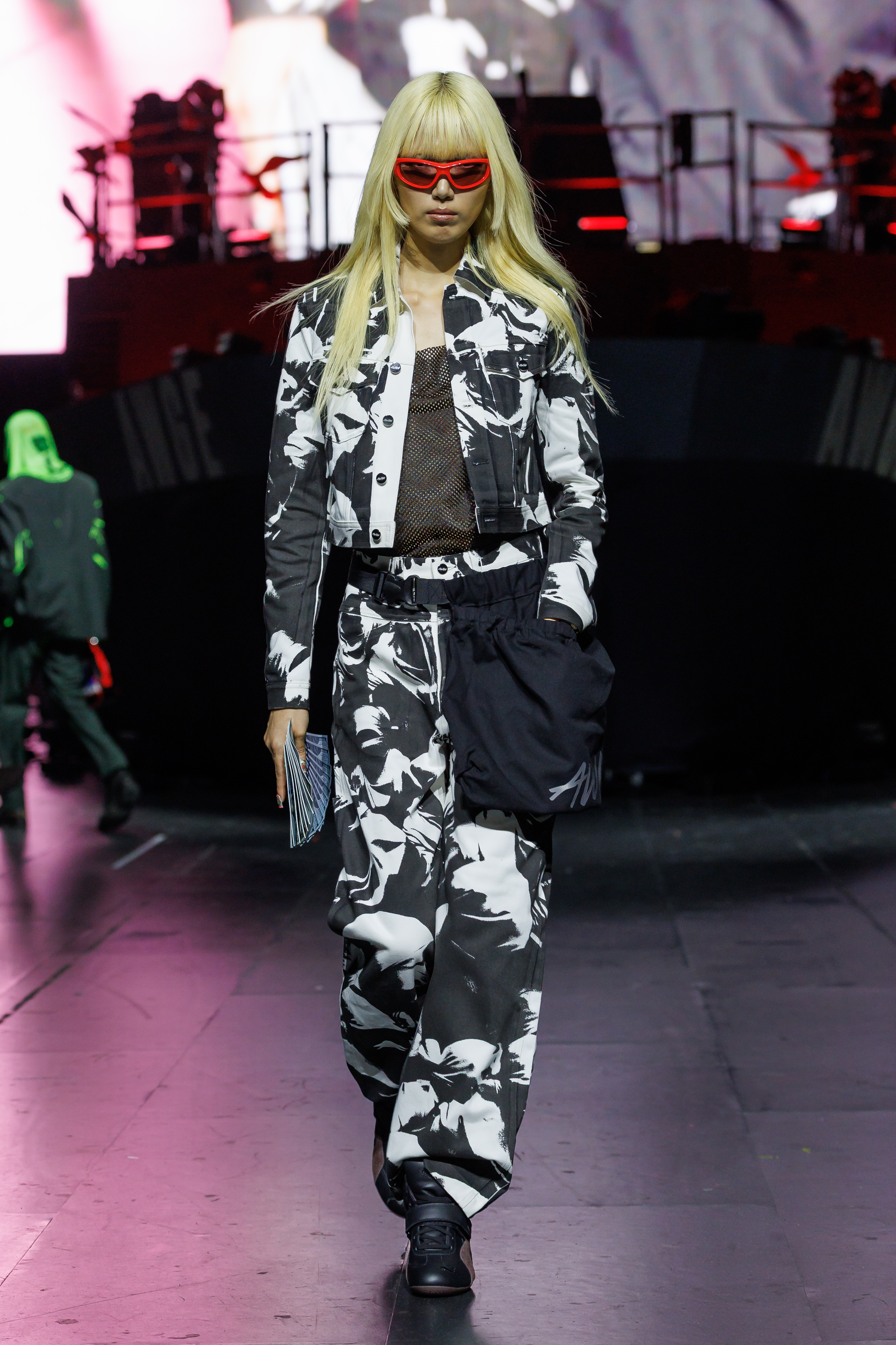 AWGE Turns the Warship Into a Daring Runway for Spring Summer 2027 Vanity Teen A$AP Rocky's AWGE / Anti-War Global Economics brings military codes, concert dressing, luxury and streetwear together for a collection that stays deliberately caught between seriousness and spectacle.