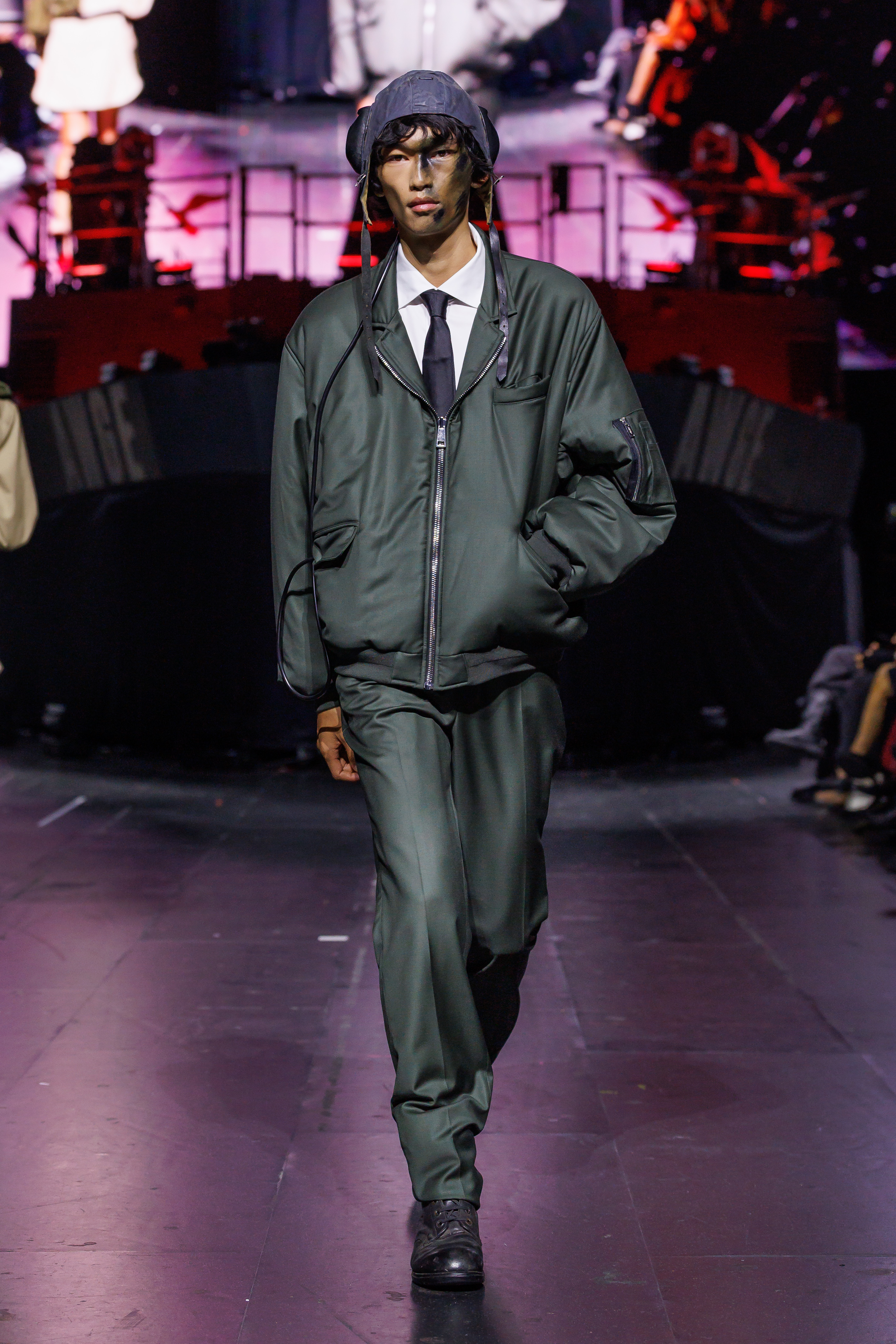 AWGE Turns the Warship Into a Daring Runway for Spring Summer 2027 Vanity Teen A$AP Rocky's AWGE / Anti-War Global Economics brings military codes, concert dressing, luxury and streetwear together for a collection that stays deliberately caught between seriousness and spectacle.