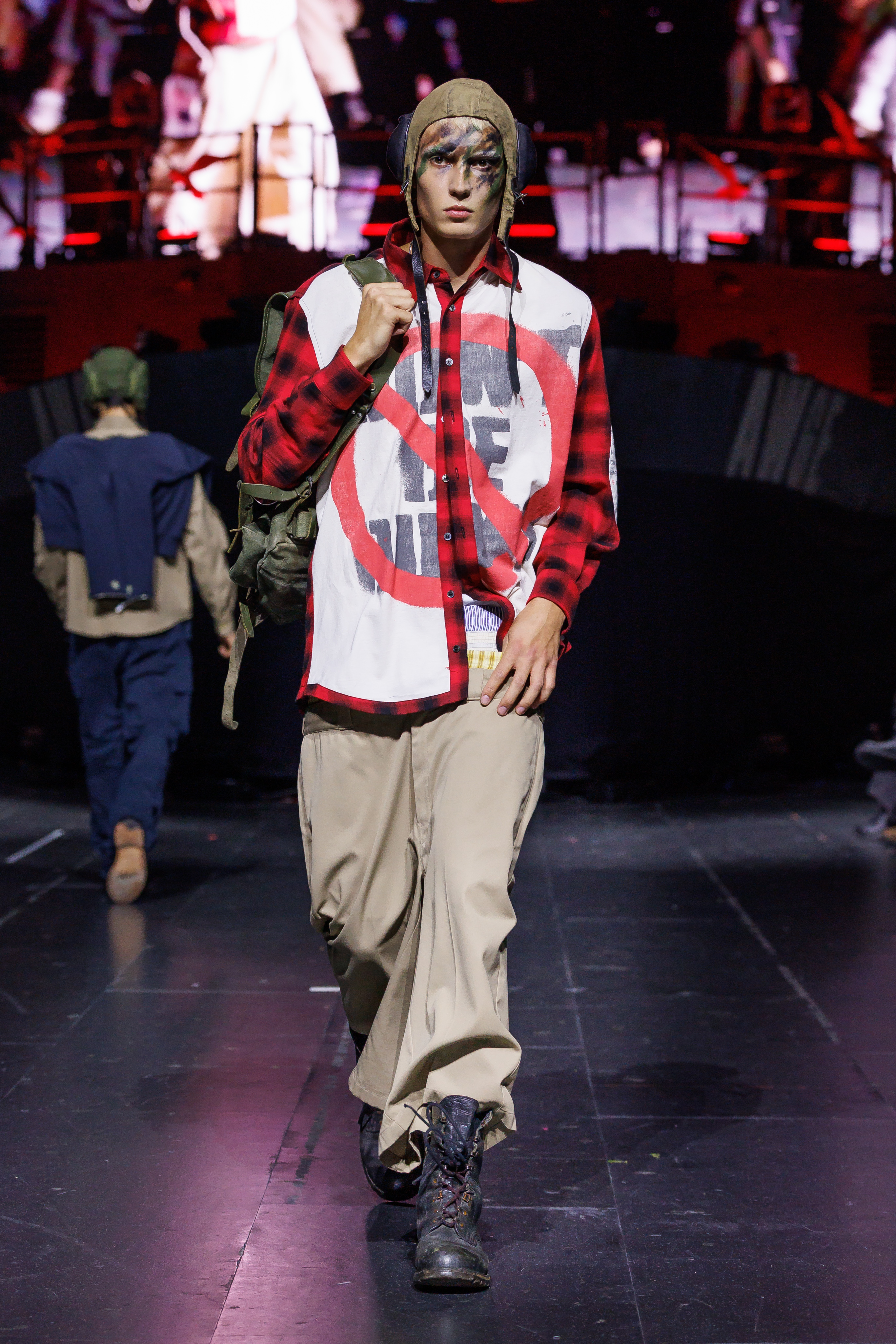 AWGE Turns the Warship Into a Daring Runway for Spring Summer 2027 Vanity Teen A$AP Rocky's AWGE / Anti-War Global Economics brings military codes, concert dressing, luxury and streetwear together for a collection that stays deliberately caught between seriousness and spectacle.
