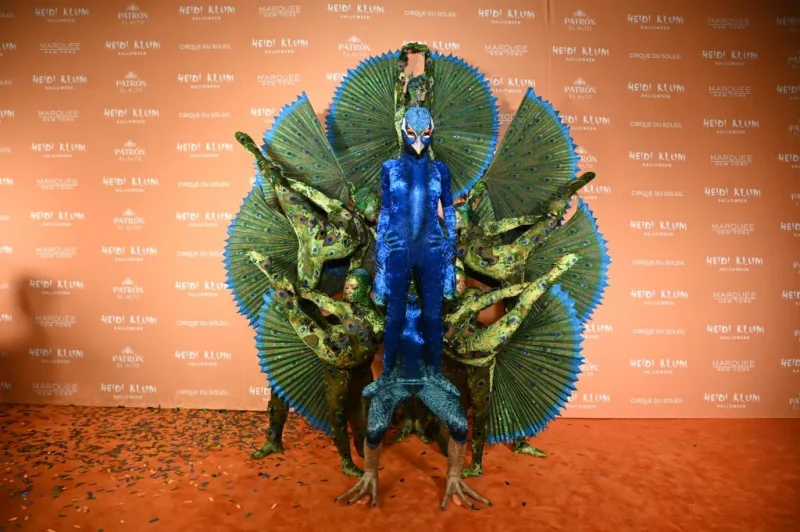 Heidi Klum dressed as a peacock